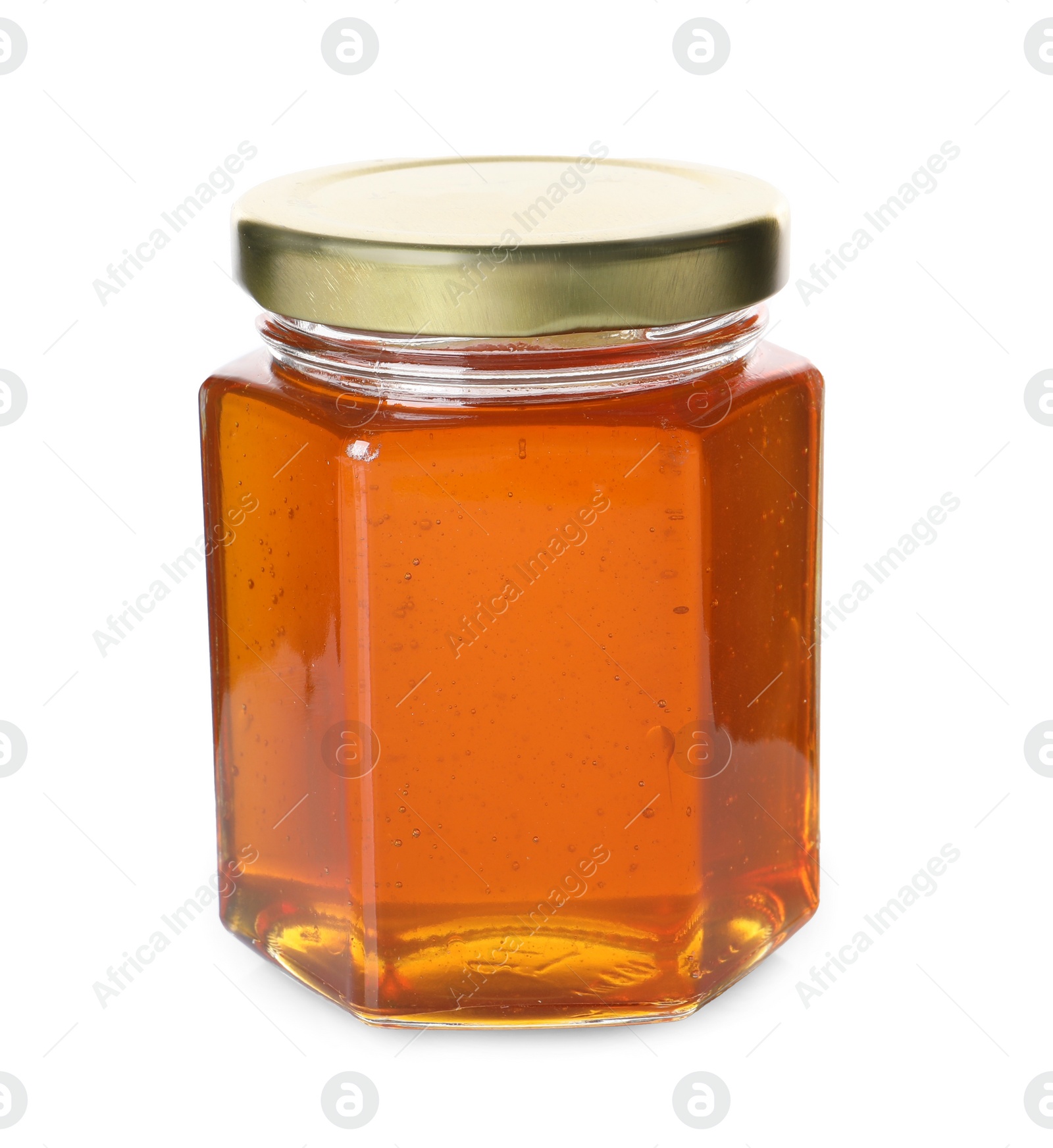 Photo of Tasty natural honey in glass jar isolated on white