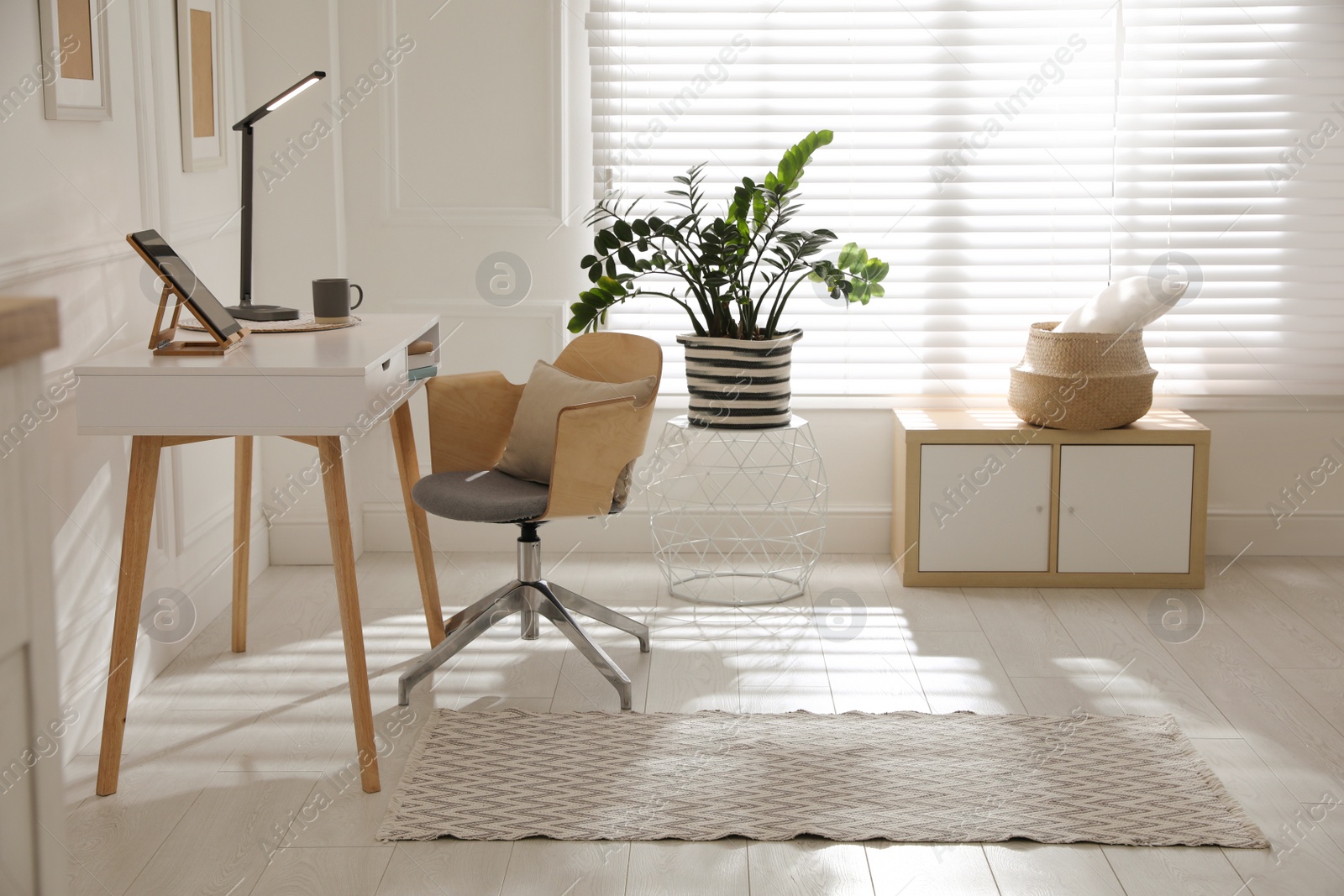 Photo of Stylish rug with pattern on floor in room