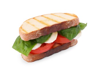 Photo of Delicious Caprese sandwich with mozzarella, tomatoes and basil isolated on white