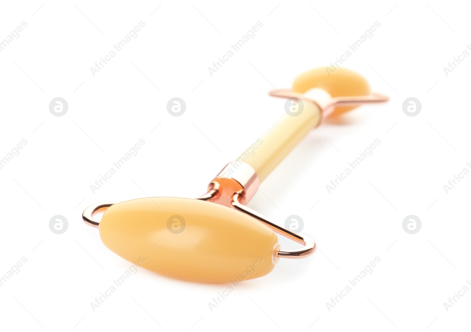 Photo of Natural jade face roller on white background