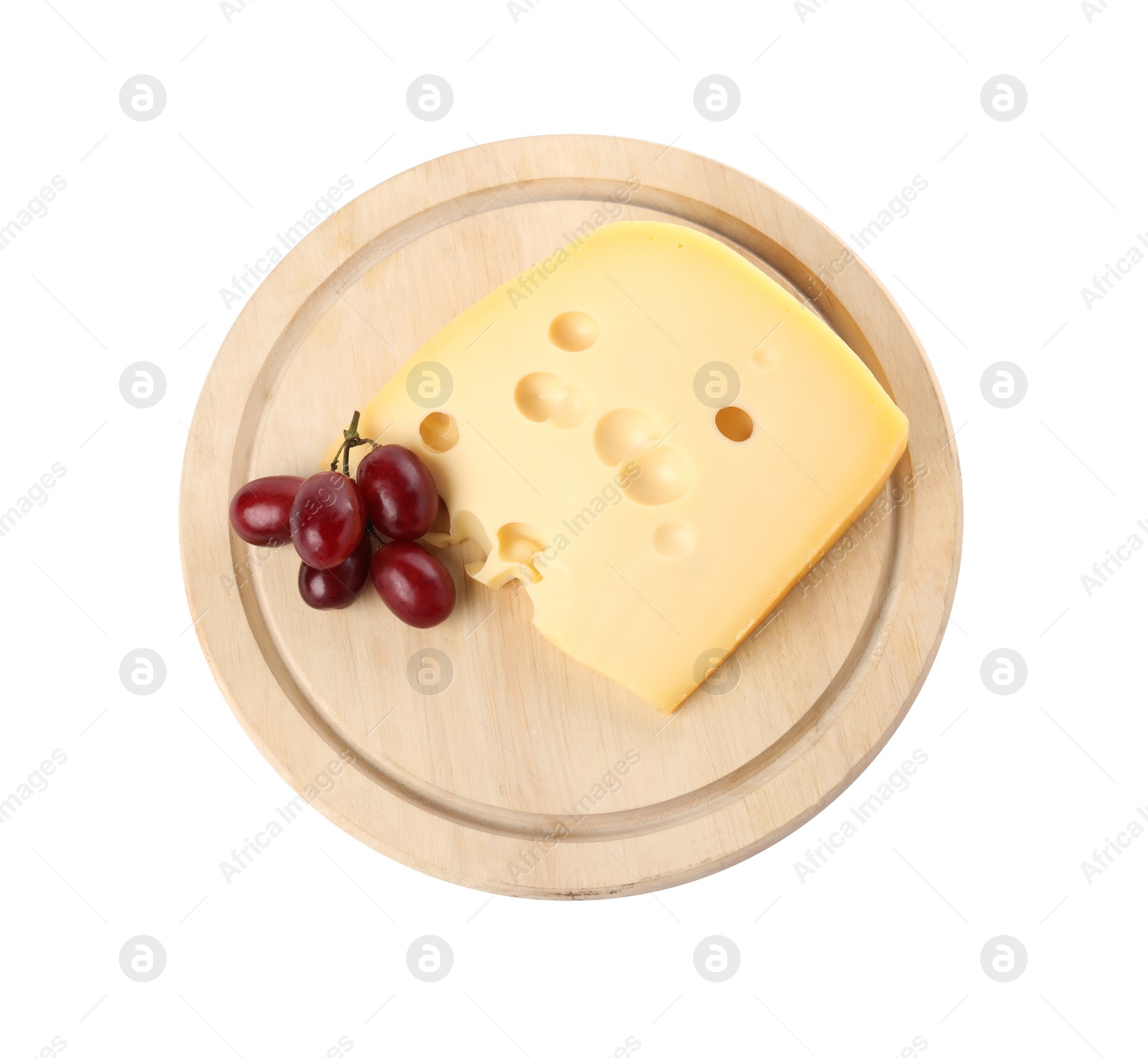 Photo of Piece of delicious cheese and grapes isolated on white, top view