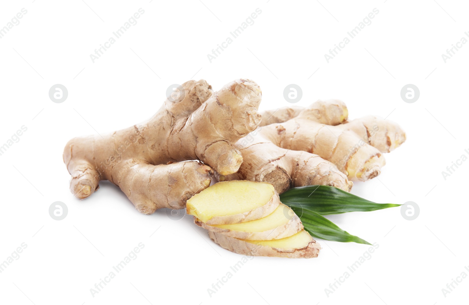 Photo of Whole and cut fresh ginger with leaves isolated on white