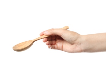 Photo of Woman holding clean wooden spoon on white background, closeup