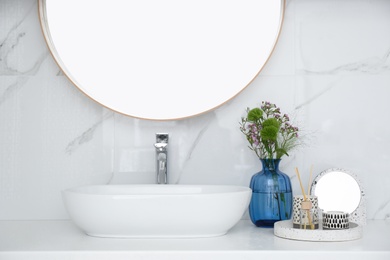 Photo of Modern bathroom interior with stylish mirror and vessel sink