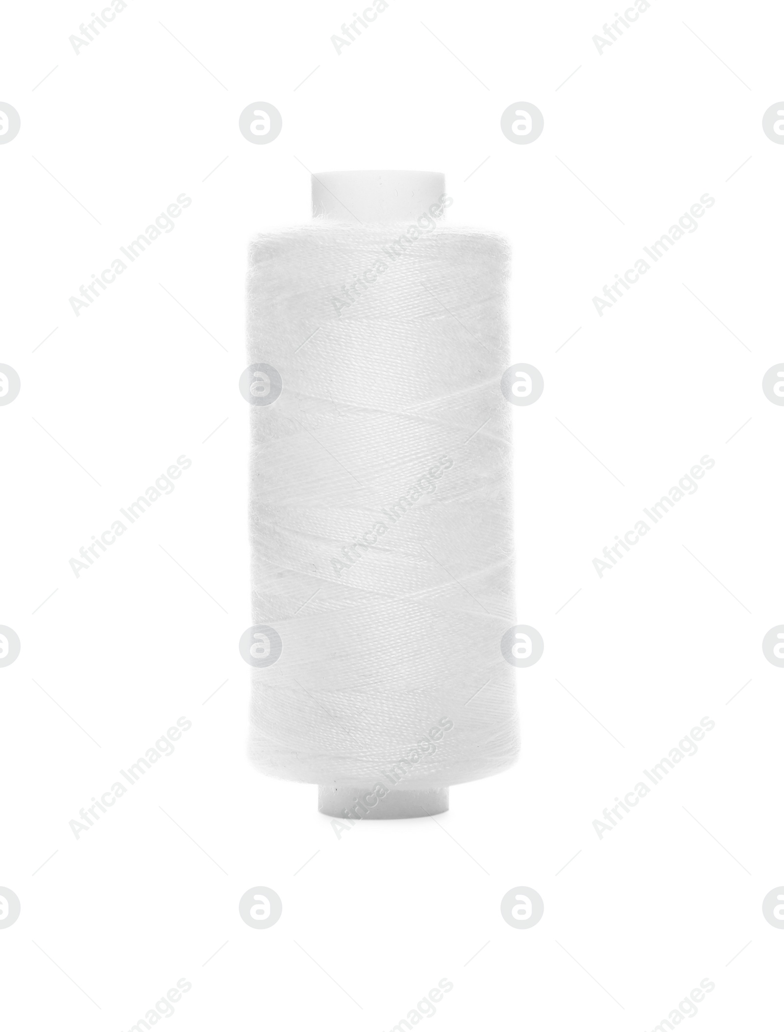 Photo of Spool of sewing thread isolated on white