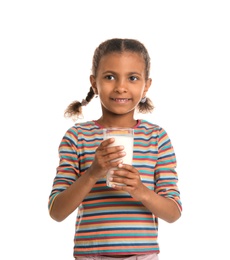 Adorable African-American girl with glass of milk on white background