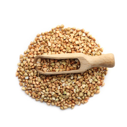 Photo of Scoop with pile of green buckwheat isolated on white, top view