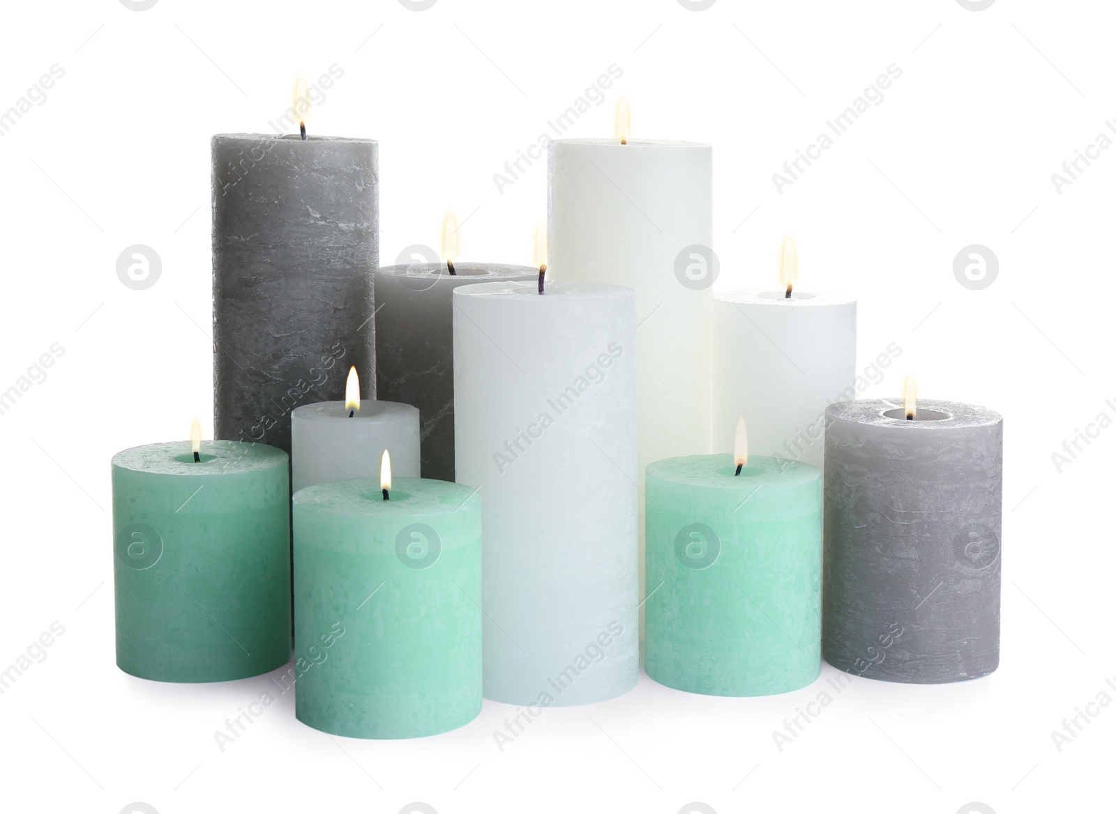 Photo of Set of different color candles on white background