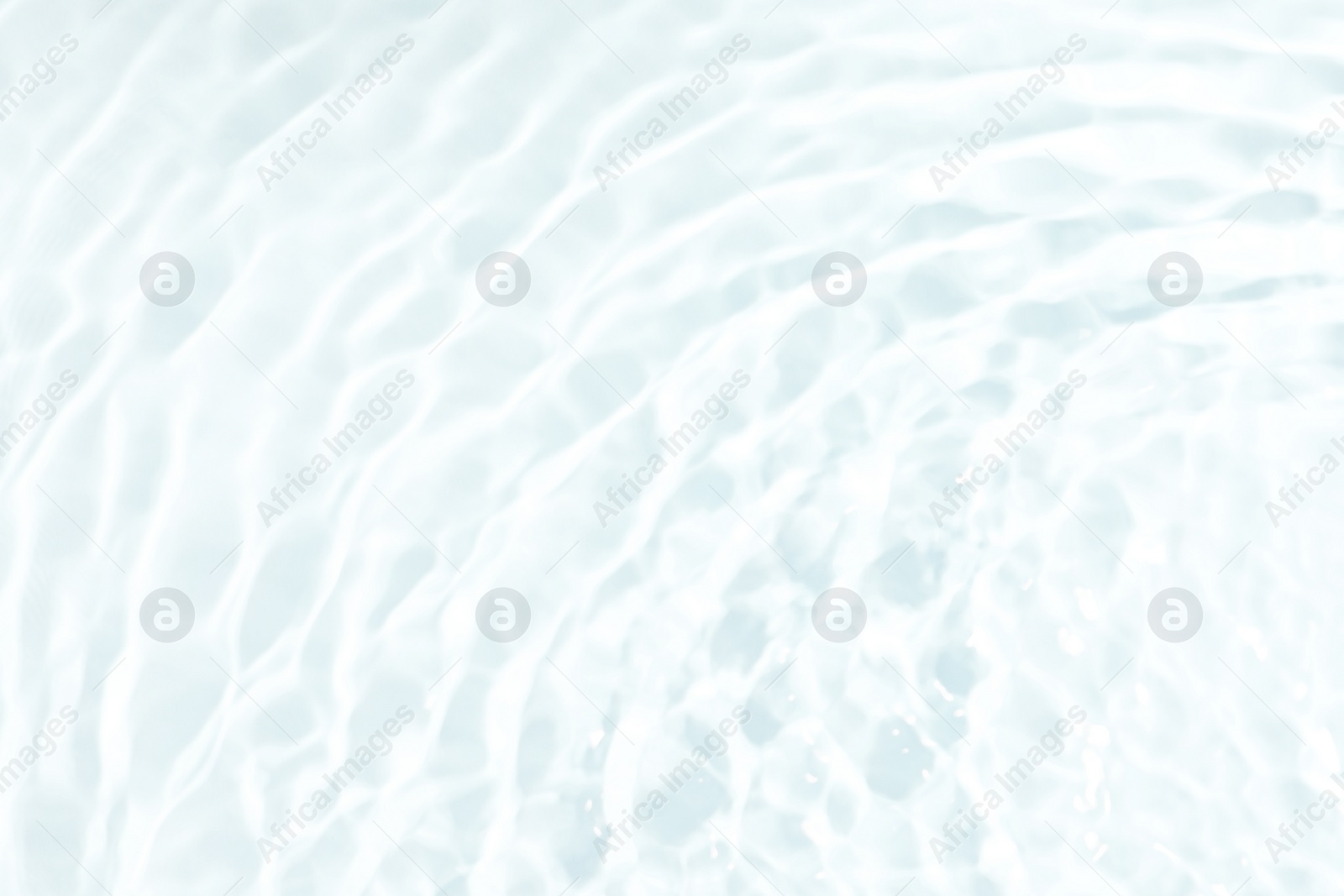 Image of Closeup view of water with ripples on white background