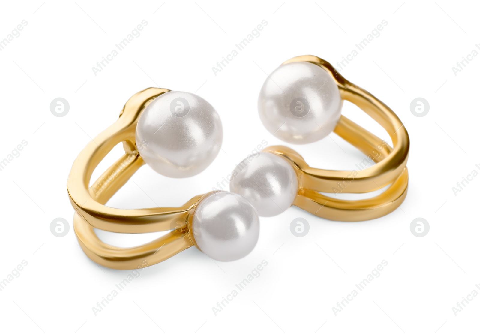 Photo of Elegant earrings with pearls isolated on white