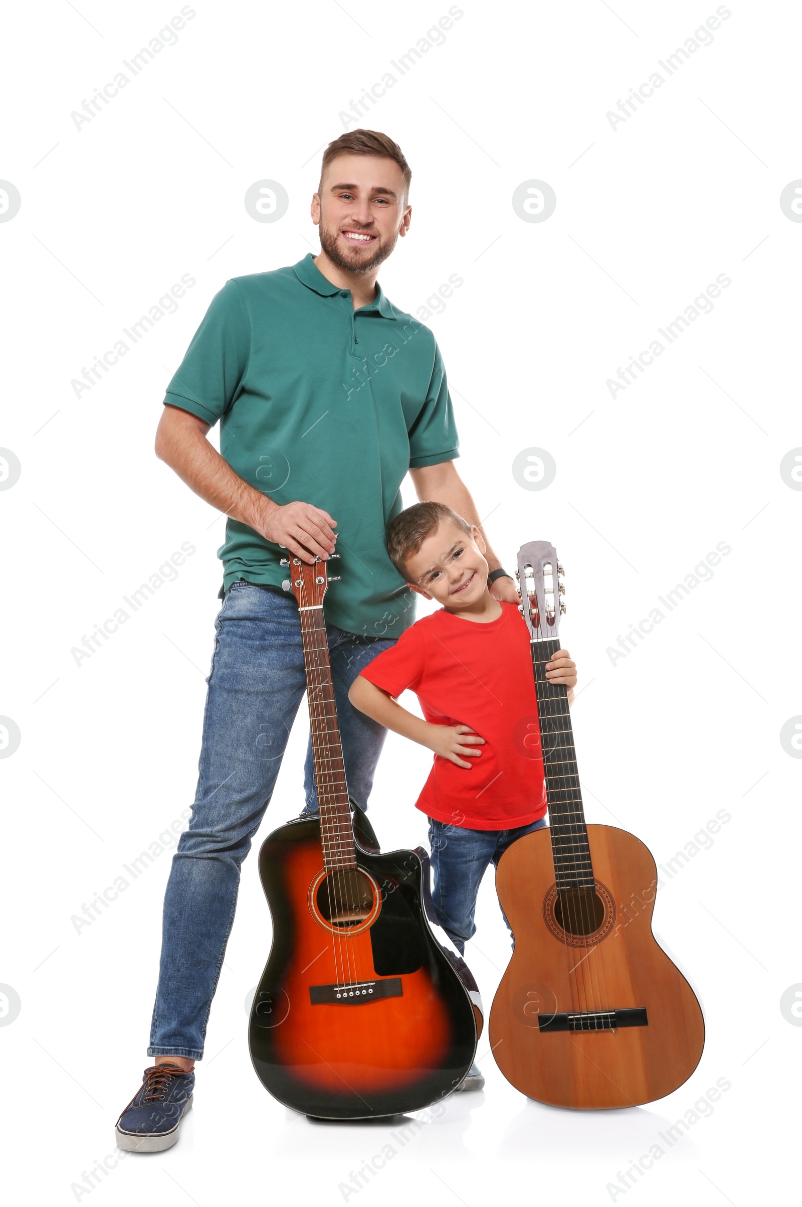Photo of Father and son with acoustic guitars on white background