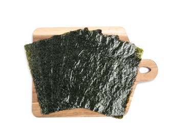 Photo of Wooden board with dry nori sheets on white background, top view