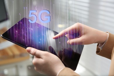 Image of Woman using tablet with 5G network system in office, closeup