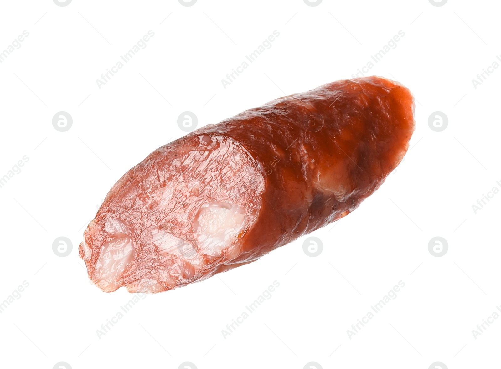 Photo of Piece of thin dry smoked sausage isolated on white