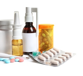 Photo of Pills and drugs for cold on white background