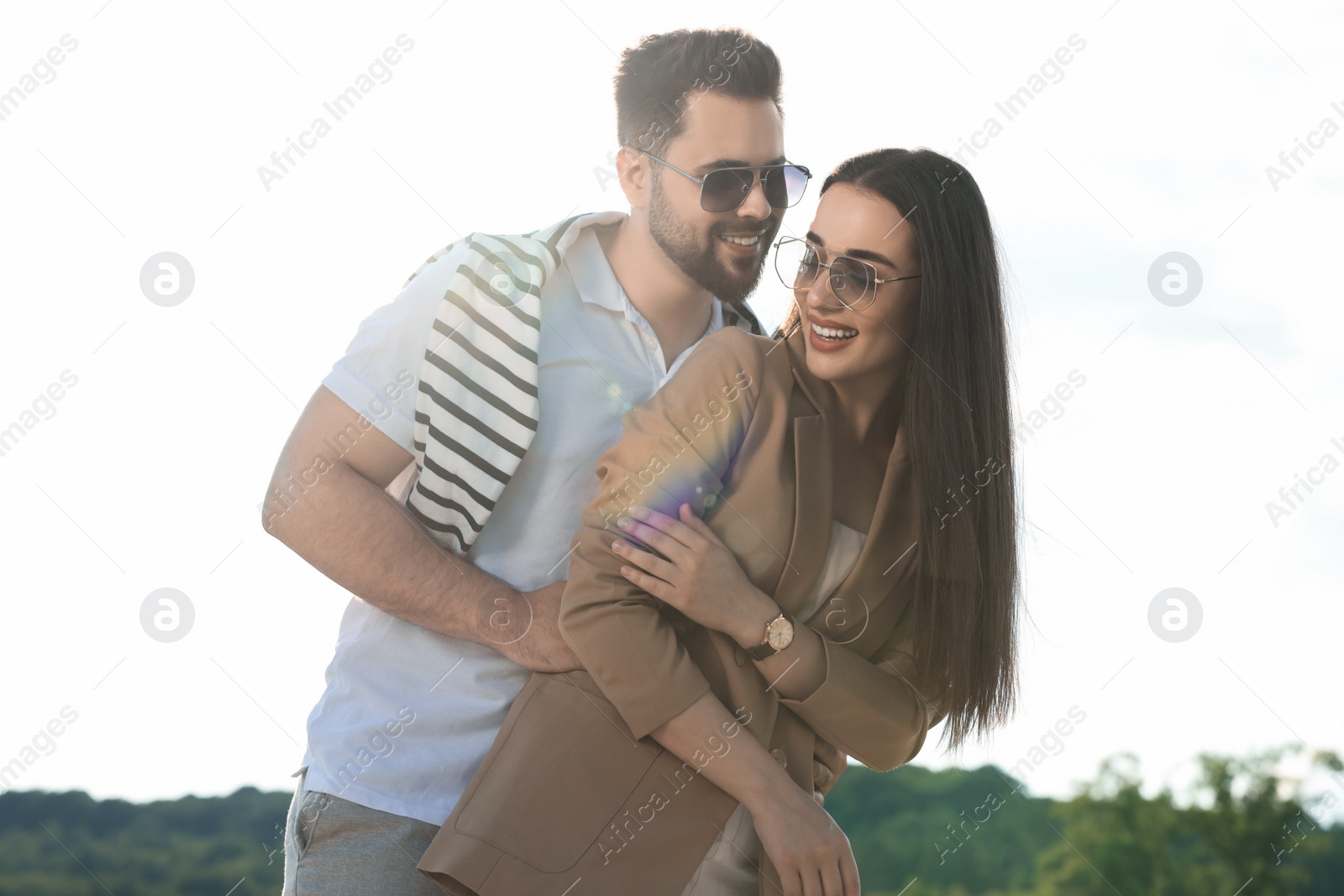 Photo of Romantic date. Beautiful couple spending time together outdoors