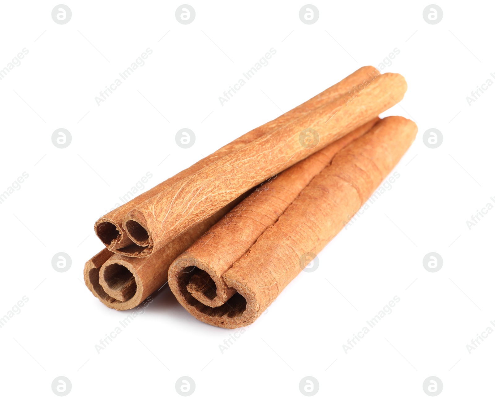 Photo of Three aromatic cinnamon sticks isolated on white