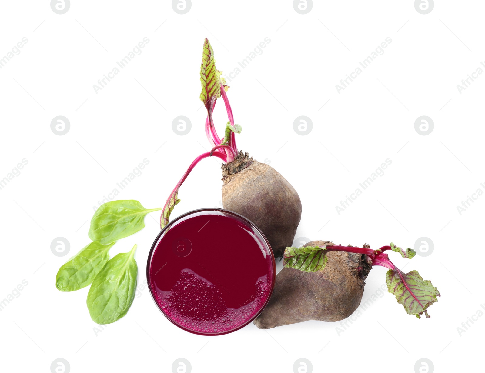 Photo of Freshly made beet juice on white background, top view