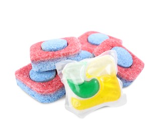 Photo of Dishwasher detergent pod and tablets on white background