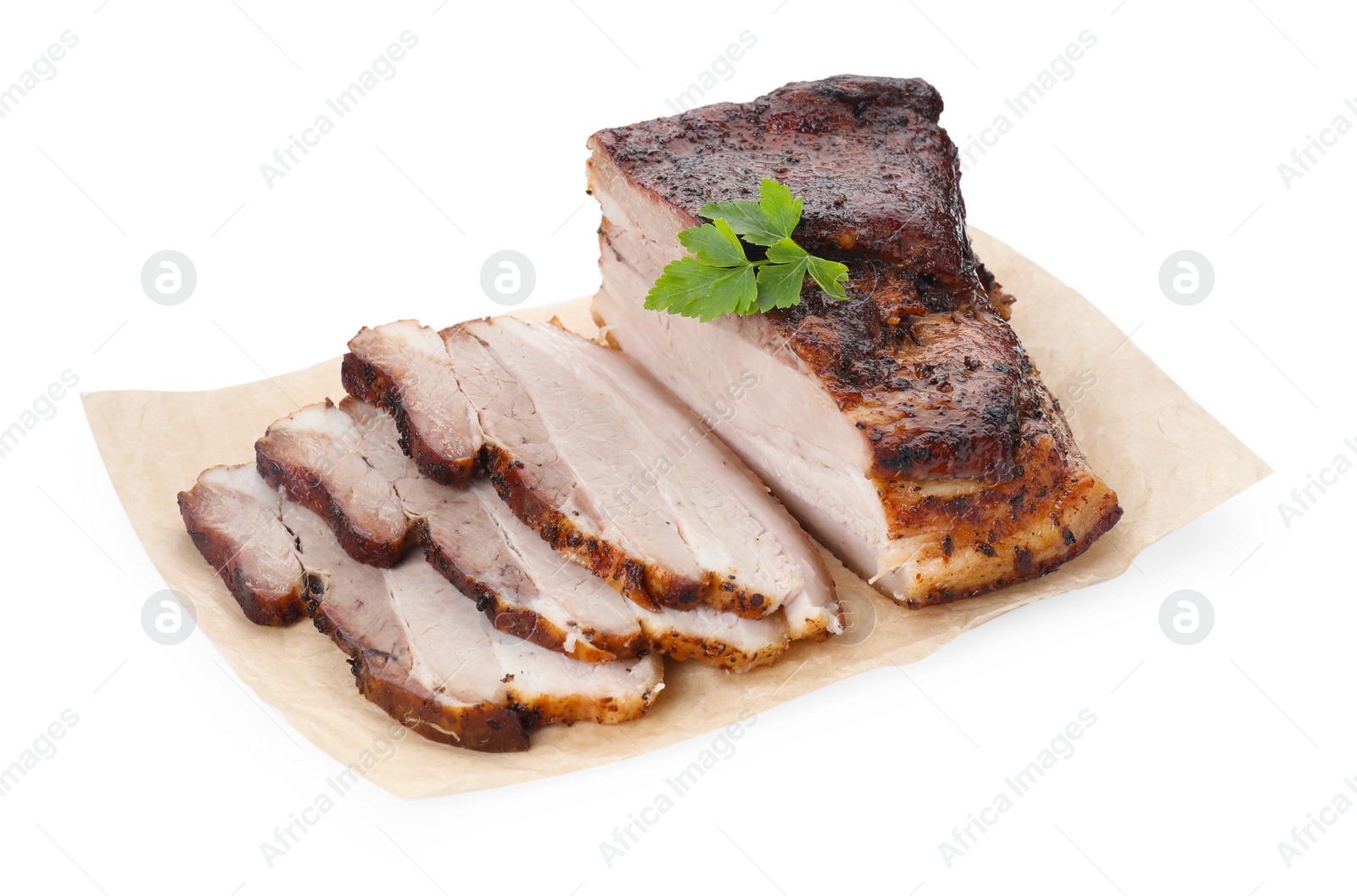 Photo of Pieces of tasty baked pork belly with parsley isolated on white