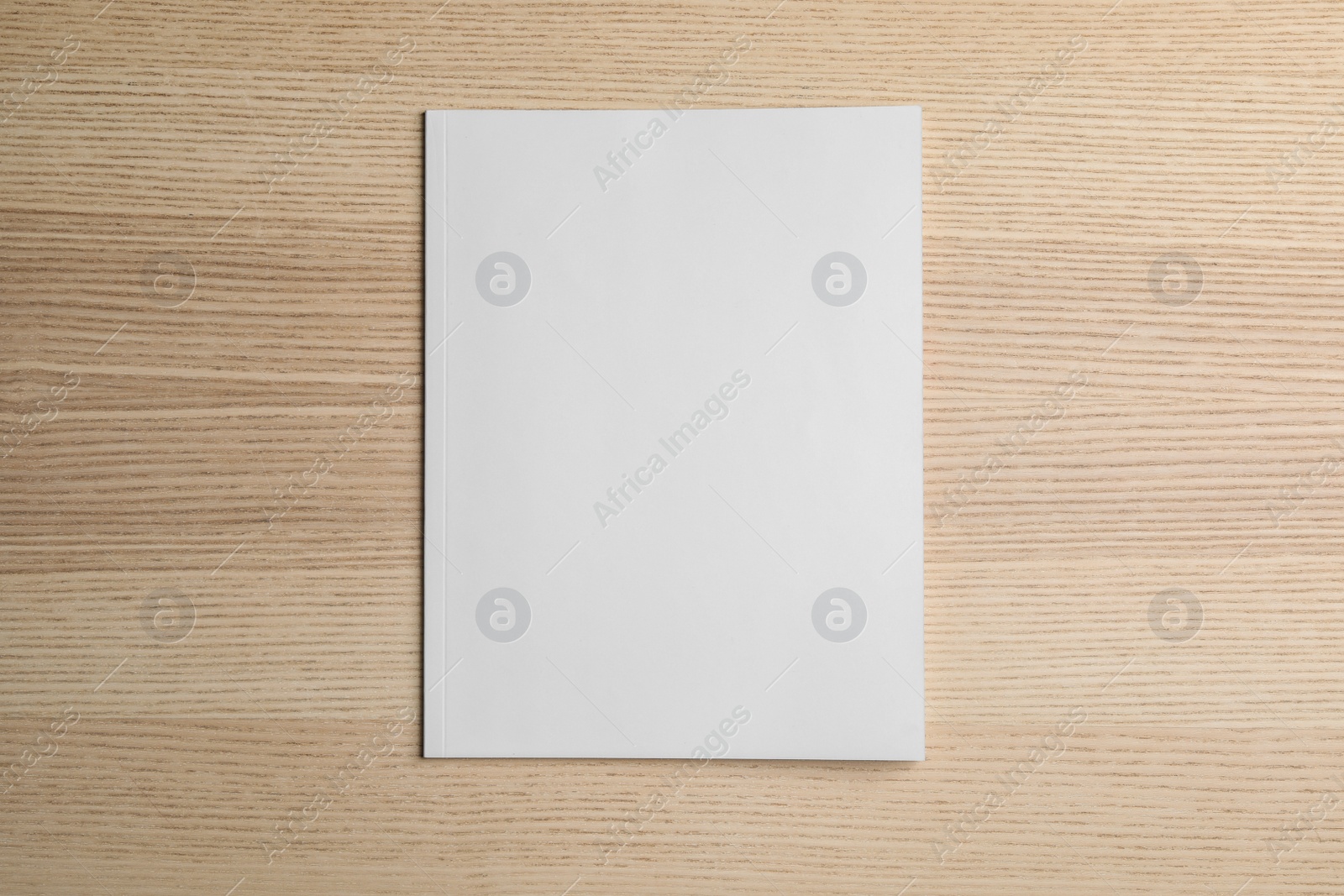 Photo of Brochure with blank cover on wooden background, top view. Mock up for design