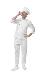 Photo of Chef in uniform showing perfect sign on white background