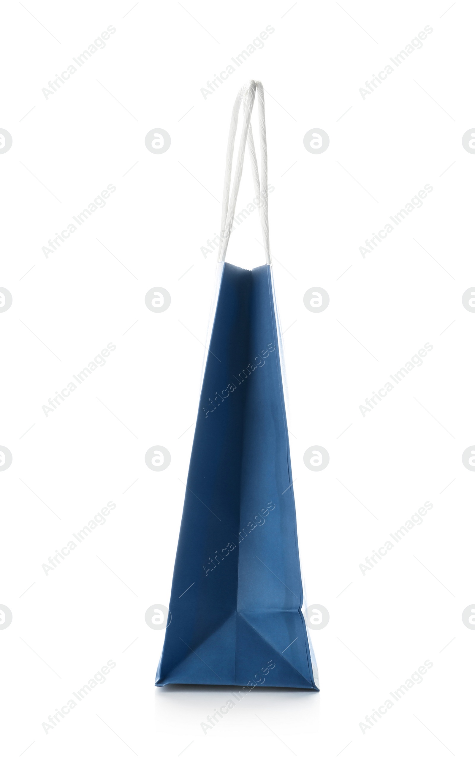 Photo of Empty paper shopping bag on white background