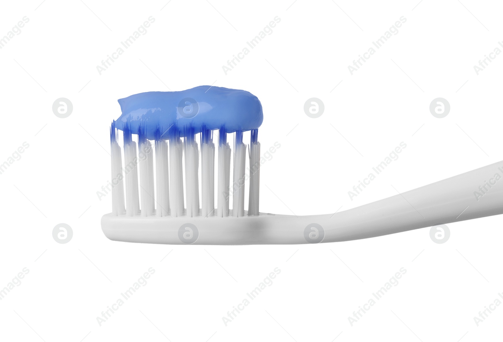 Photo of Plastic toothbrush with paste on white background, closeup