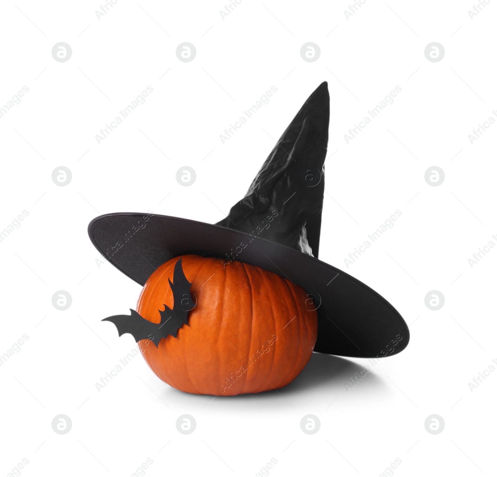 Photo of Orange pumpkin with witch hat and black paper bat isolated on white. Halloween decor