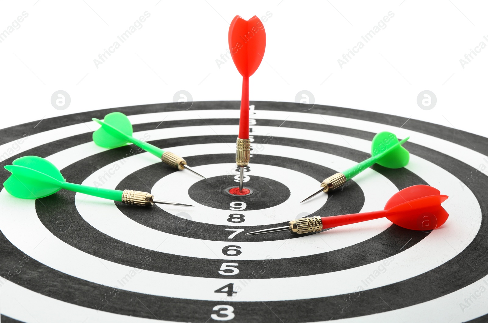 Photo of Dart board with color arrows hitting target, closeup