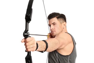 Man with bow and arrow practicing archery on white background