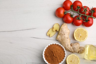 Photo of Different fresh ingredients for marinade on white wooden table, flat lay. Space for text