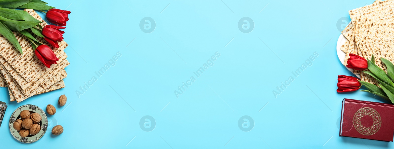 Image of Flat lay composition with matzos on light blue background, space for text. Passover (Pesach) celebration