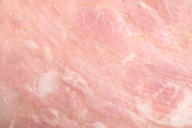 Photo of Tasty ham as background, closeup. Fresh delicacy