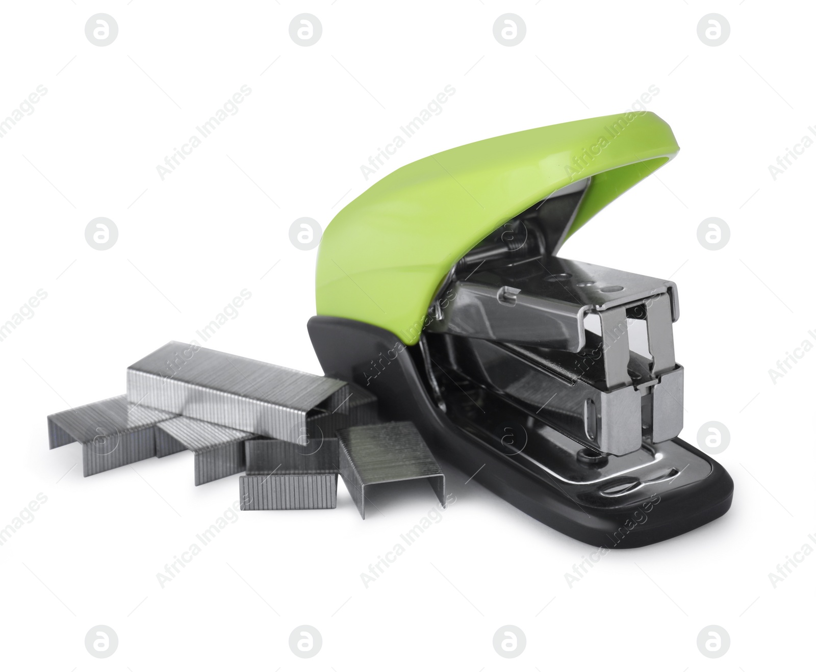 Photo of Bright green stapler with staples isolated on white