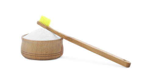 Photo of Bamboo toothbrush and bowl with baking soda on white background