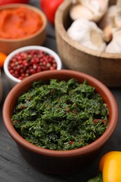 Photo of Fresh marinade in bowl on grey table, closeup