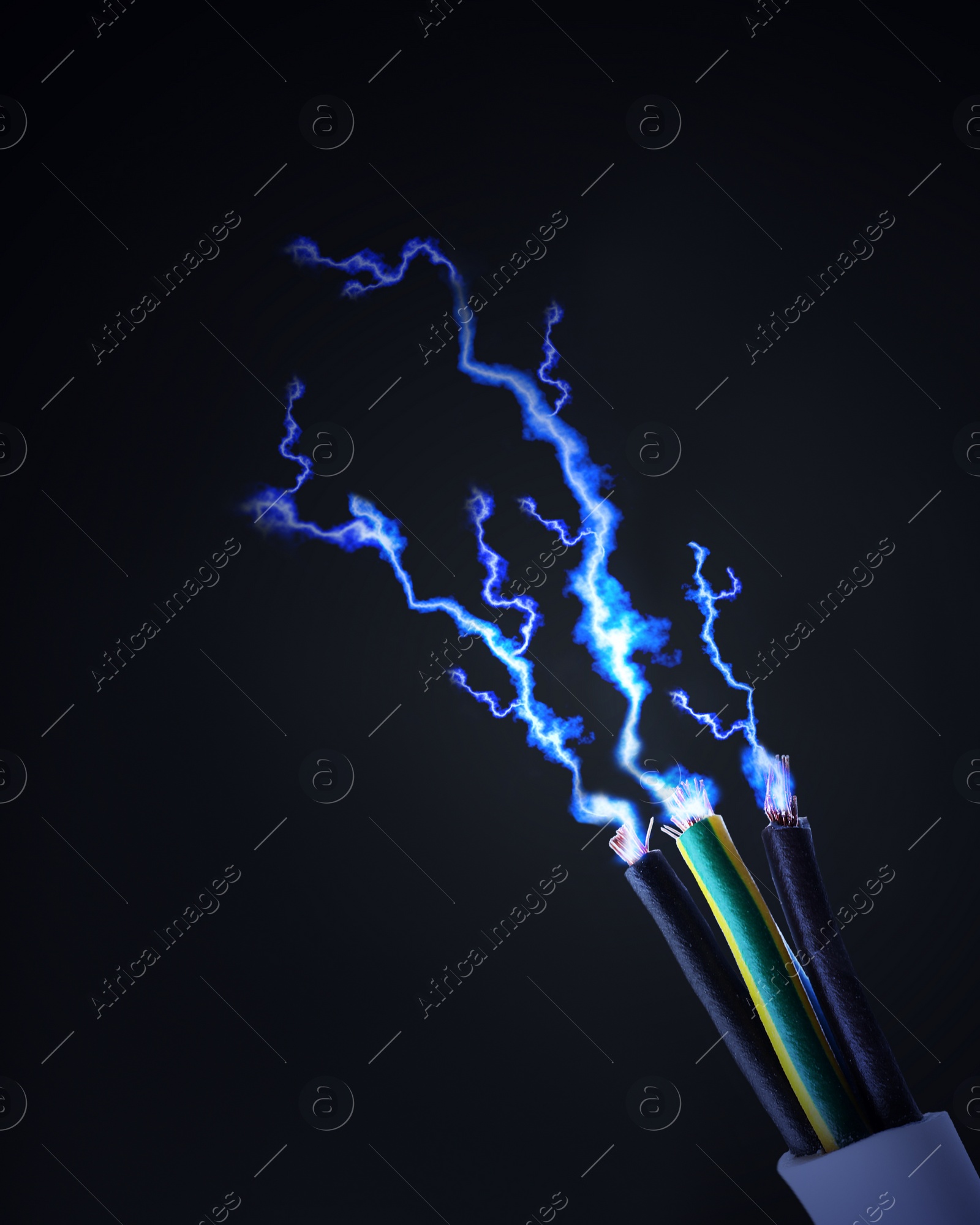 Image of Sparking cables on black background, closeup. Electrician's supply