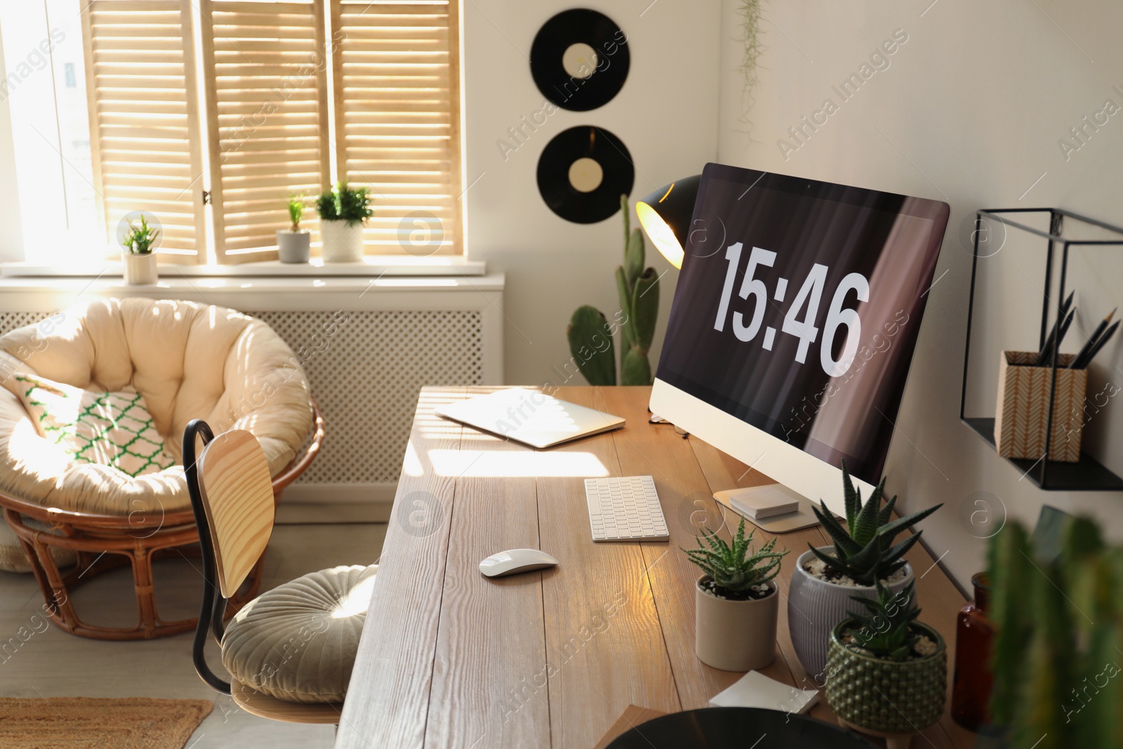 Photo of Room interior with comfortable workplace. Modern computer on wooden desk