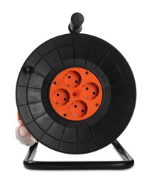 Photo of Extension cord reel on white background. Electrician's equipment