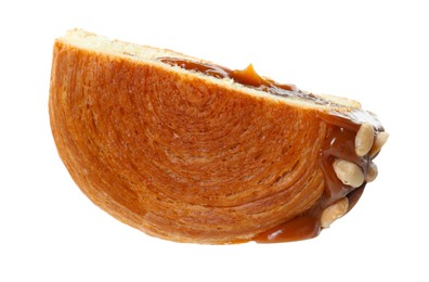 Photo of Half of round croissant with chocolate paste and nuts isolated on white. Tasty puff pastry