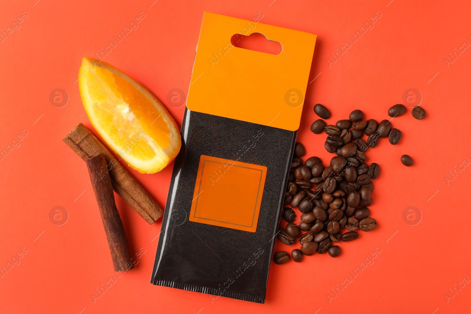 Photo of Flat lay composition with scented sachet on coral background