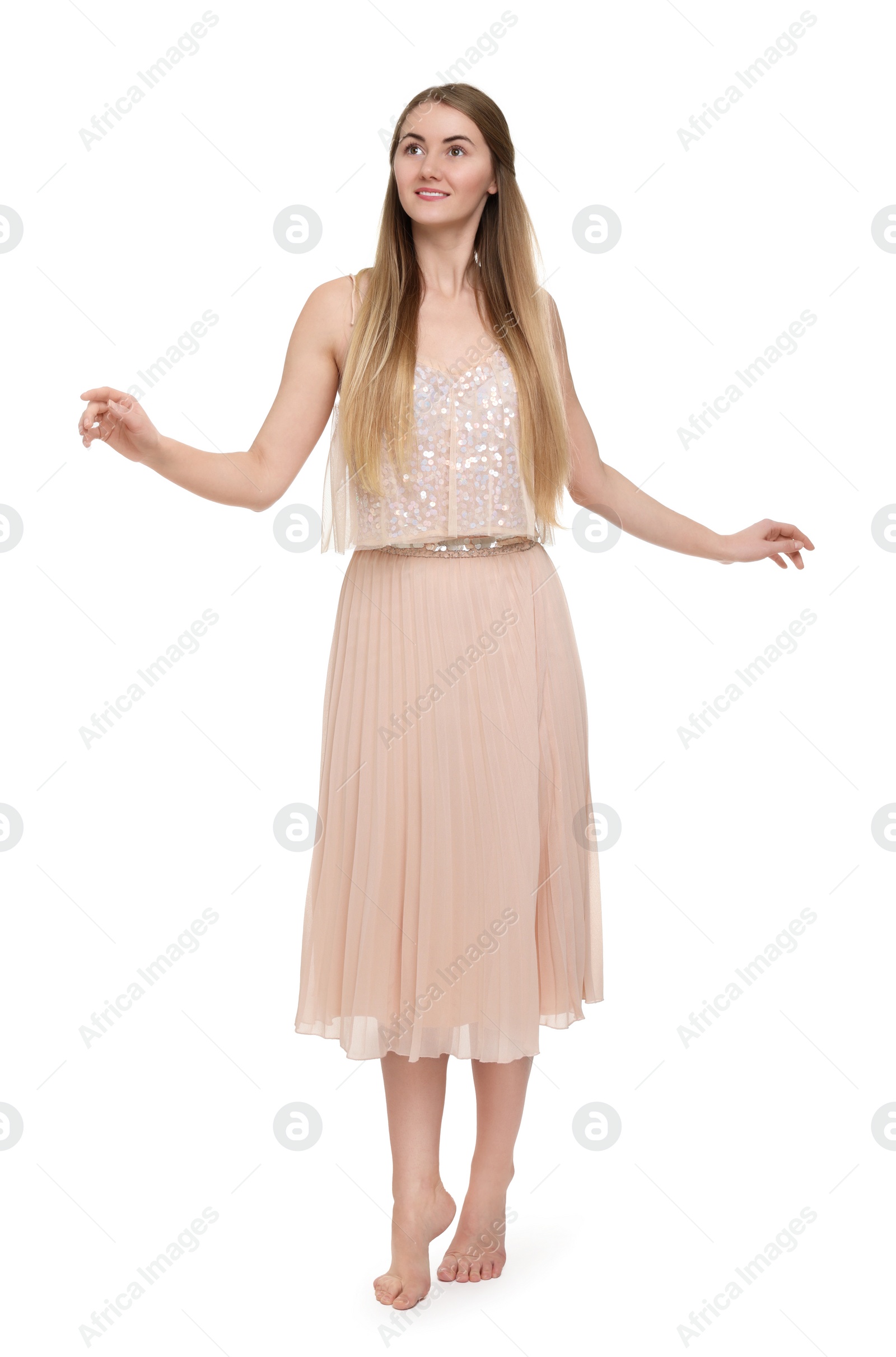 Photo of Beautiful girl in beige skirt on white background