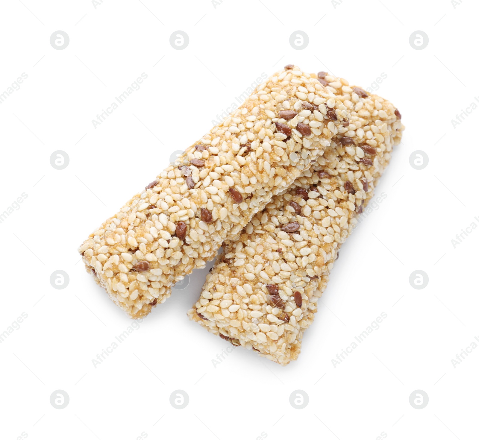 Photo of Tasty sesame seed bars isolated on white