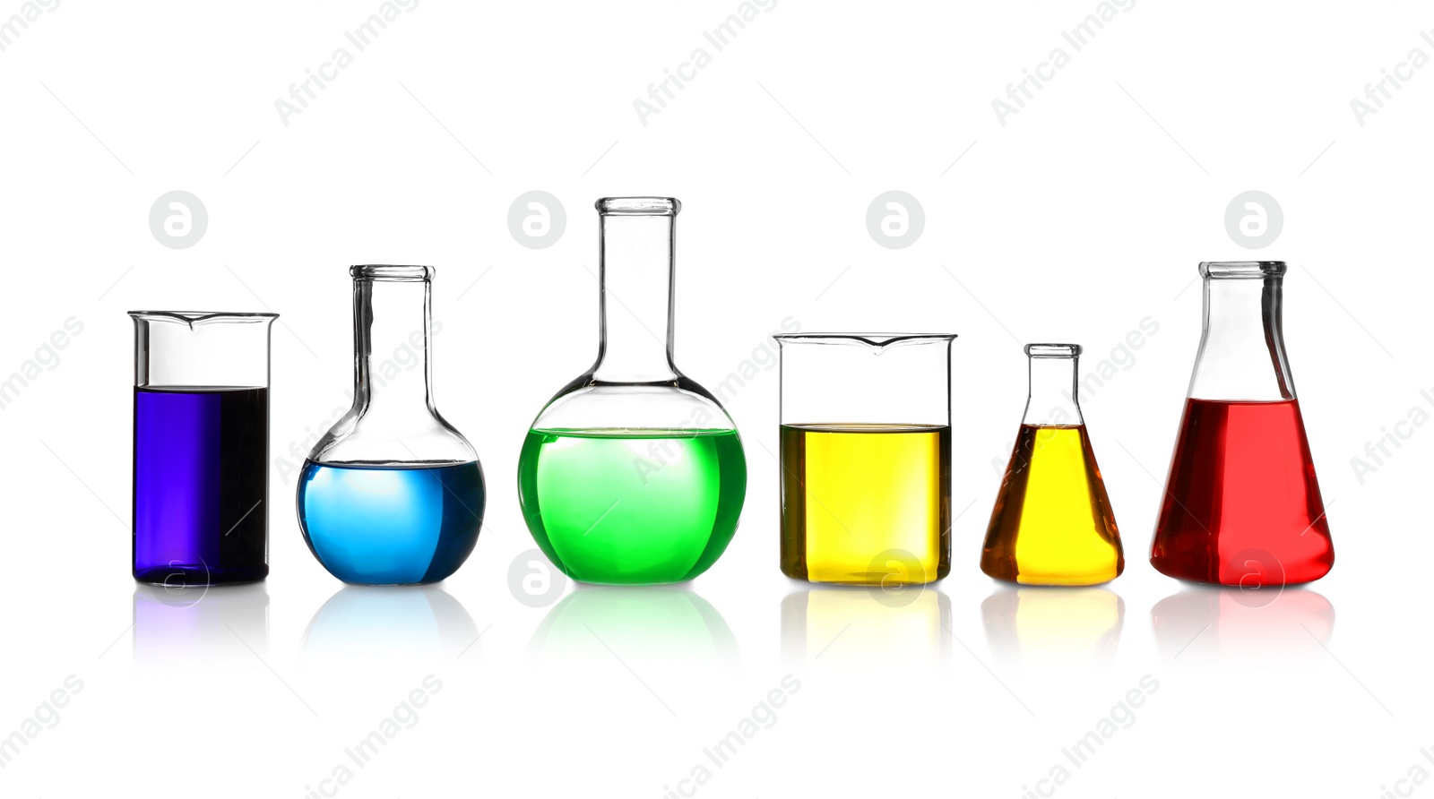 Photo of Laboratory glassware with different samples on white background. Solution chemistry