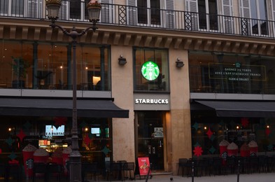 Photo of Paris, France - December 10, 2022: Starbucks coffee shop exterior