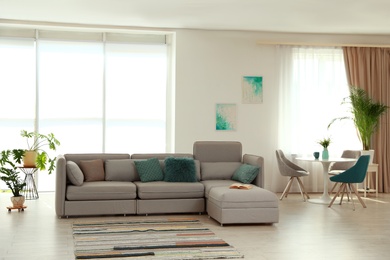 Photo of Modern living room interior with comfortable sofa