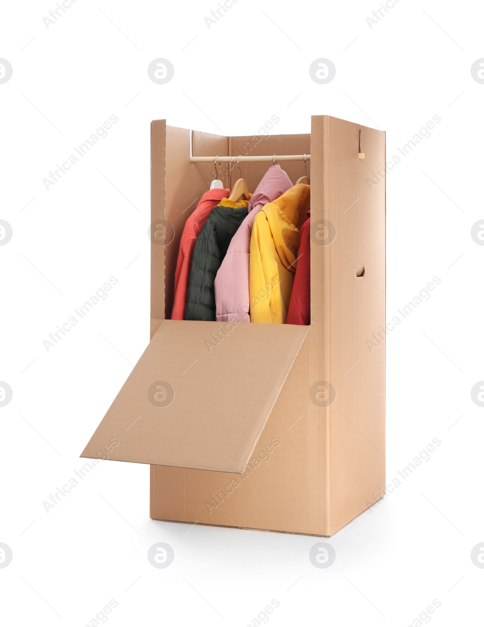 Photo of Cardboard wardrobe box with clothes on white background