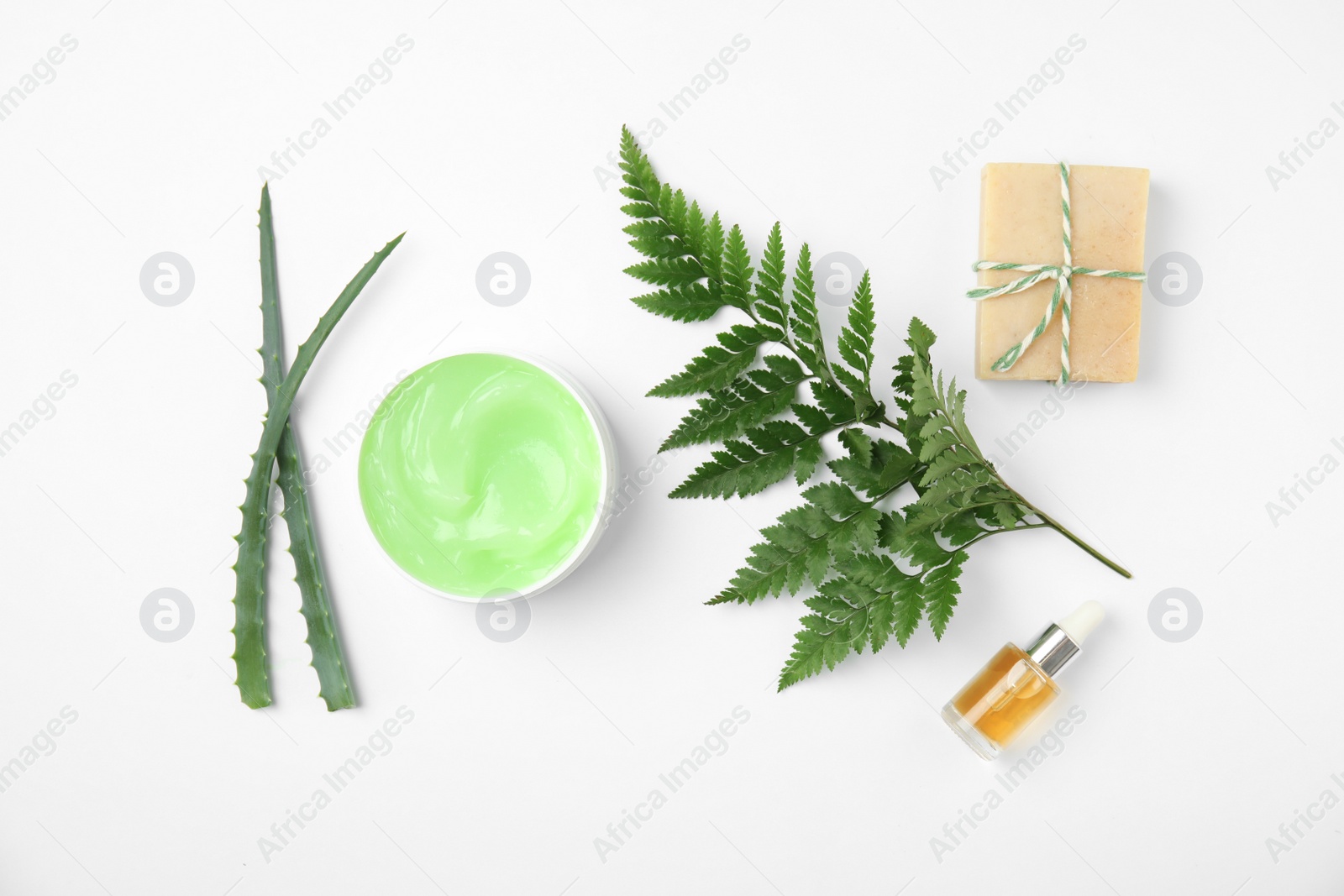 Photo of Flat lay composition with different body care products on white background