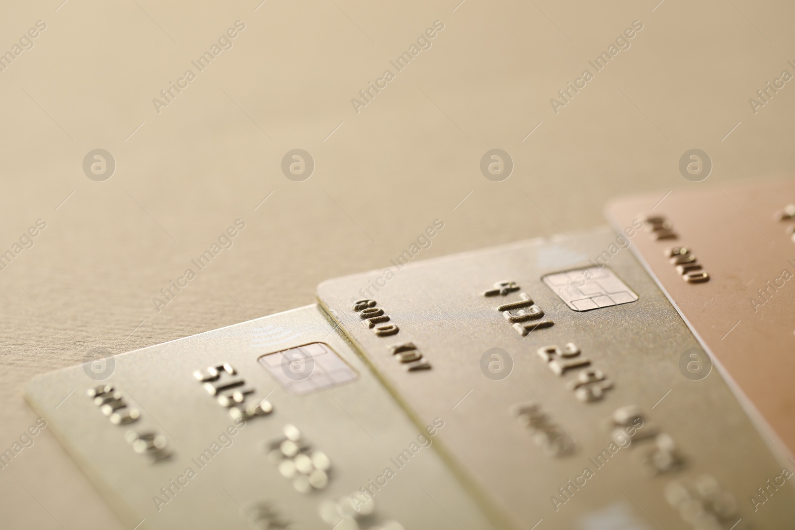 Photo of Different credit cards on table, closeup view. Space for text